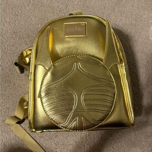 Warner Bros. Metallic Gold Backpack